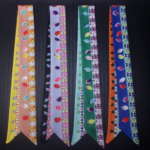 Silk-like ribbon scarves with vintage gemstone patterns in four vibrant colors