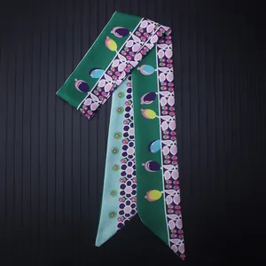 Green and blue silk scarf with jewelry pendant print for bags and hair styling