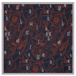 Navy blue faux silk square scarf featuring orange geometric city map patterns and fashion motifs