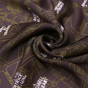 Detailed macro view of chocolate brown silk scarf with Paris city map and street pattern