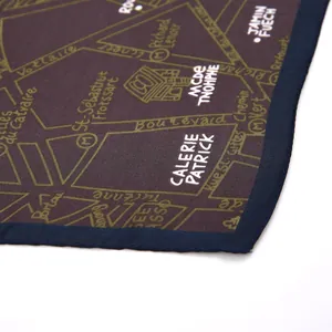 Detailed close-up of geometric map pattern on premium silk-like square neck scarf