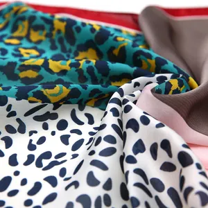 53cm leopard print satin square silk scarf for women featuring bold blue and tan patterns