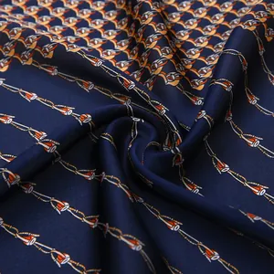 53cm square silk scarf with deep blue chain print pattern in a vortex folding layout
