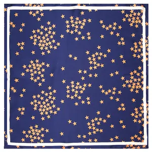Navy blue square silk scarf with orange star patterns and white border trim