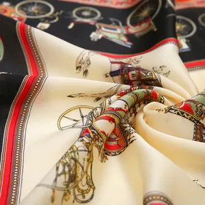 Detail of silk-like satin scarf with classic equestrian carriage pattern and smooth texture