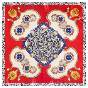 Detail of red square silk scarf with leopard print, gold pocket watch, and chain patterns