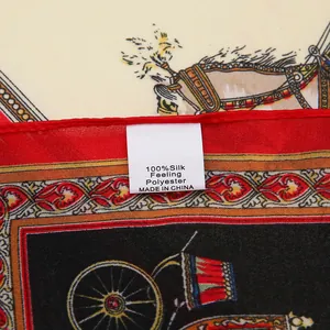 Close-up of vintage carriage print silk-feel scarf with detailed bohemian border