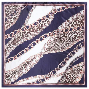 90x90cm silk scarf featuring elegant leopard print and golden chain patterns on blue stripes