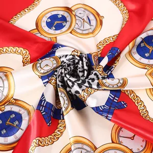 Close-up of leopard print and golden chain pattern on premium silk satin square scarf