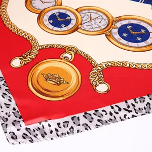 Detailed macro view of vintage satin scarf with golden chain and leopard print