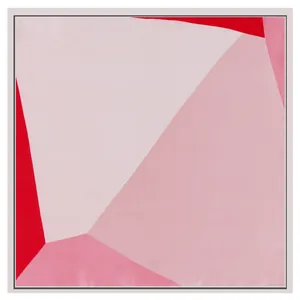Flat lay view of silk square scarf featuring geometric color blocks in red and pink tones