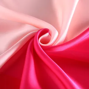 Silk square scarf featuring a geometric diamond pattern with a pink color gradient
