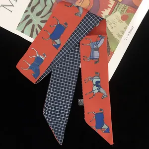 Double-sided twilly scarf with horse harness patterns and classic blue grid design