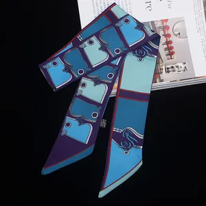 Zijden sjaal voor handtassen met geometrische patronen en elegante kleurblokken