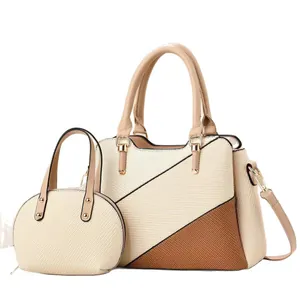 Contrast woven tote bag and small oval handbag set with leather straps and gold hardware