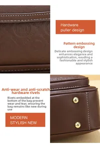 Detail of lychee textured leather bag with embossed geometric patterns and gold studs