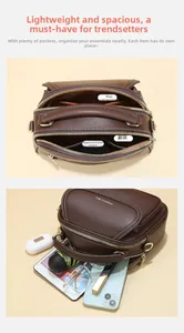 Detail view of large capacity interior with multiple zip compartments and faux leather texture