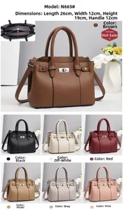 Detailed view of the multi-compartment interior and lychee leather texture of the tote bag
