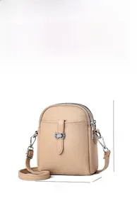 Detailed dimension chart showing 14x7x18cm size and lychee texture of the mini beige bag
