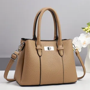 Lychee pattern faux leather tote bag with silver lock and adjustable crossbody strap