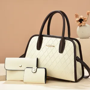 Three-piece beige quilted shoulder bag set with top handle and golden metal trim
