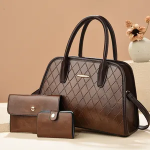 Three-piece set featuring a quilted large tote, envelope wallet, and a compact card holder