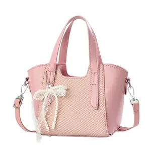 Sac à main rose en cuir PU avec nœud élégant en perles et bandoulière réglable