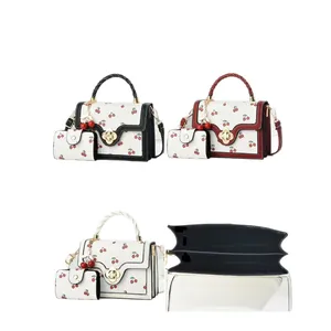 Chic cherry print handbag set with matching pouch and woven handles for stylish women