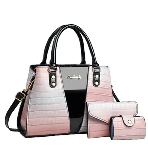 Set borse tre pezzi in ecopelle di coccodrillo rosa con tracolla rimovibile