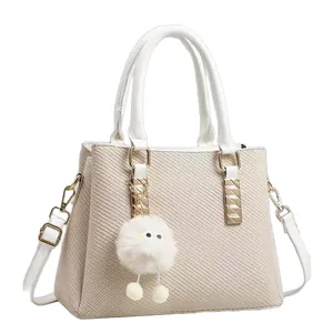 Elegant beige woven texture shoulder bag with white leather straps and gold hardware