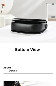 Detail view of the black leather saddle bag base and golden metal D-ring attachment