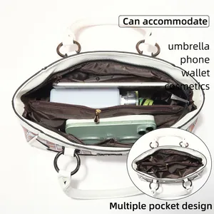 Top view of white shell bag interior showing multiple pockets and storage capacity