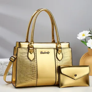 Golden 2-piece handbag set with faux crocodile texture and adjustable shoulder strap