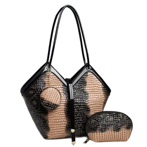 Three-piece tote bag set with black and beige animal print texture and gold hardware