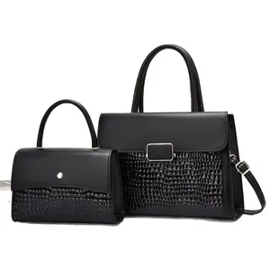 Two-piece black handbag set with crocodile pattern leather and metallic buckle detail