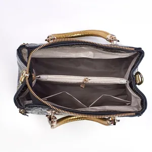 Detailed top view of large bucket bag interior with organized compartments and lining