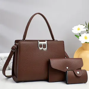 Three-piece dark brown pebble leather tote bag set with silver B logo and shoulder strap
