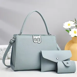 Three-piece light blue pebbled leather handbag set with stylish B-shaped silver buckle detail