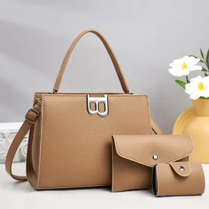 Three-piece brown litchi pattern leather bag set with silver B metal buckle and strap