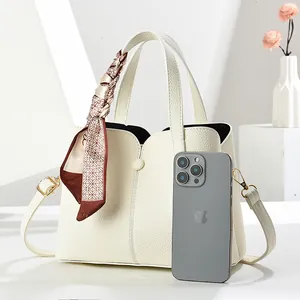 Large cream white faux leather tote bag with lychee pattern and silk scarf handle
