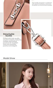 Detail of pink faux leather bag with reinforced handles and metallic swivel clasps