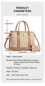 Detailed view of canvas tote bag with contrast faux leather trim and dimensions chart
