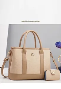 Detail of khaki canvas tote with color blocking leather trim and flower metal clasp