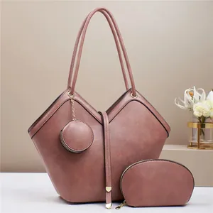 Three-piece set featuring tote, pouch, and round coin purse in elegant rose leather