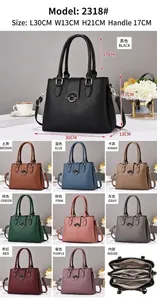 Detail view of large capacity pebbled leather handbag with dimensions and internal compartments