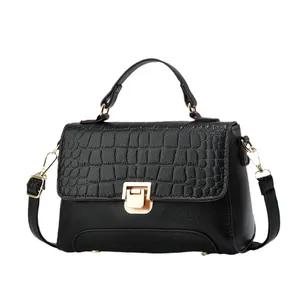 Sac à main classique en cuir noir à motif crocodile avec garniture dorée élégante