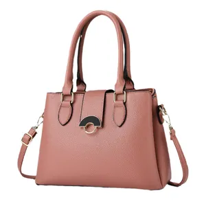Elegant dusty rose leather tote bag with lychee texture and gold-tone semicircular lock