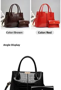 Detail view of crocodile pattern faux leather handbag set with gold hardware in three colors