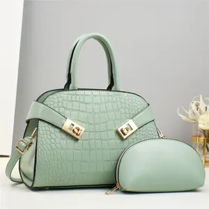 Mint green embossed crocodile pattern handbag set with crossbody strap and small pouch