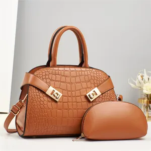 Brown crocodile embossed tote bag set with golden hardware and matching coin purse